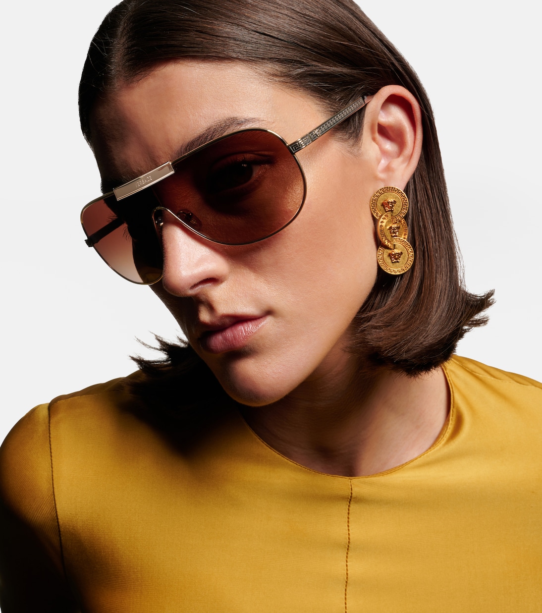 Greca Flow shield sunglasses | Versace