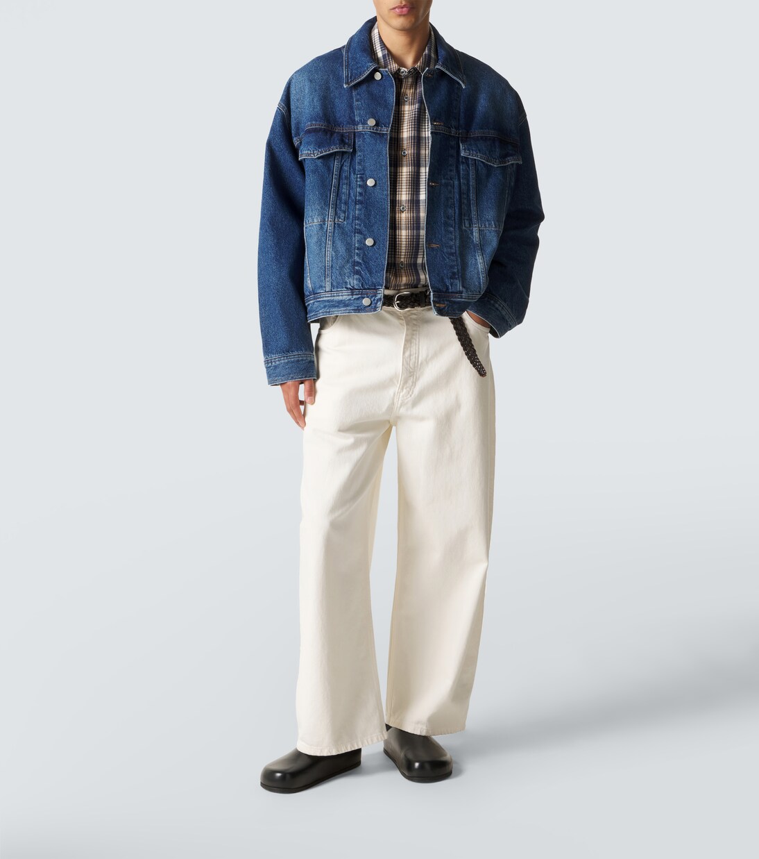 Wearing leather mules | Studio Nicholson