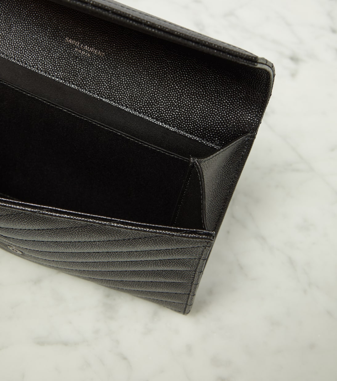 Cassandre matelassé leather clutch | Saint Laurent