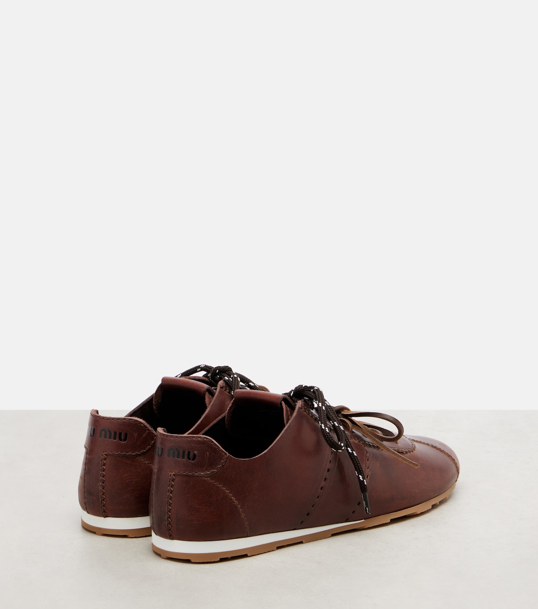 Plume leather sneakers  | Miu Miu