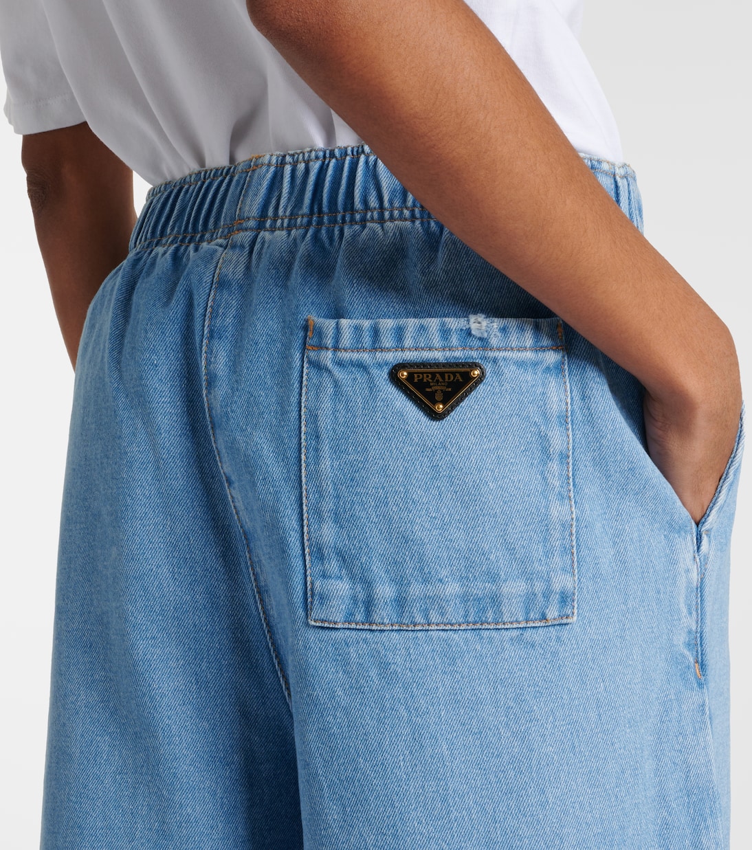 Jeans a gamba larga con logo | Prada