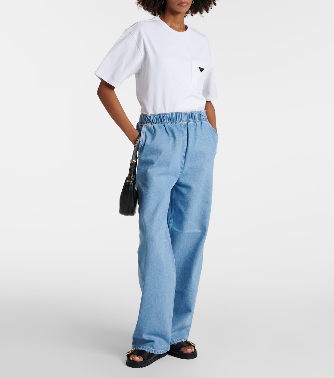 Jeans a gamba larga con logo | Prada