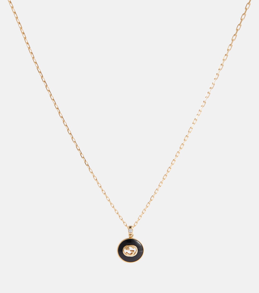 Interlocking G 18kt gold necklace with onyx and diamond | Gucci