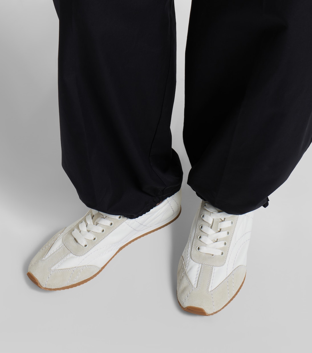 Flex suede-trimmed sneakers | Toteme