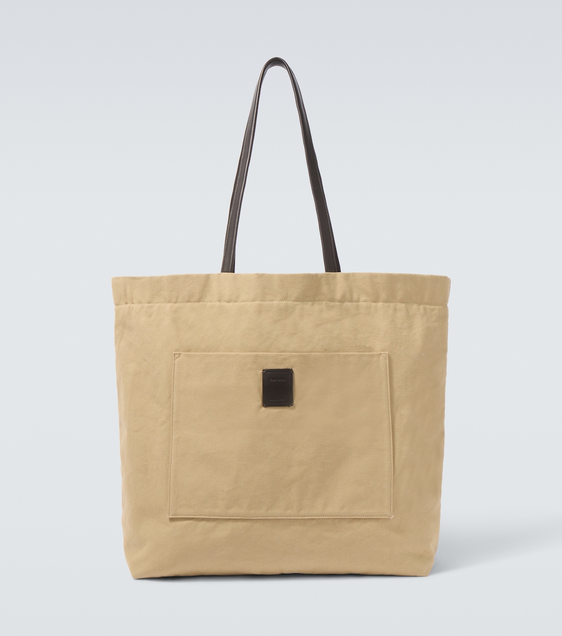 Tori leather-trimmed canvas tote bag | The Row