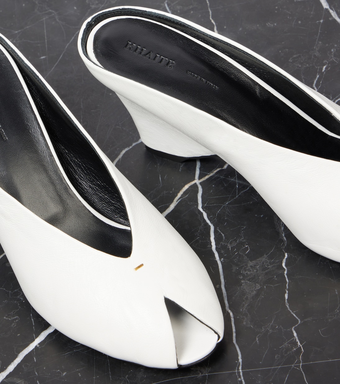 Cloak 75 leather peep-toe wedge mules | Khaite