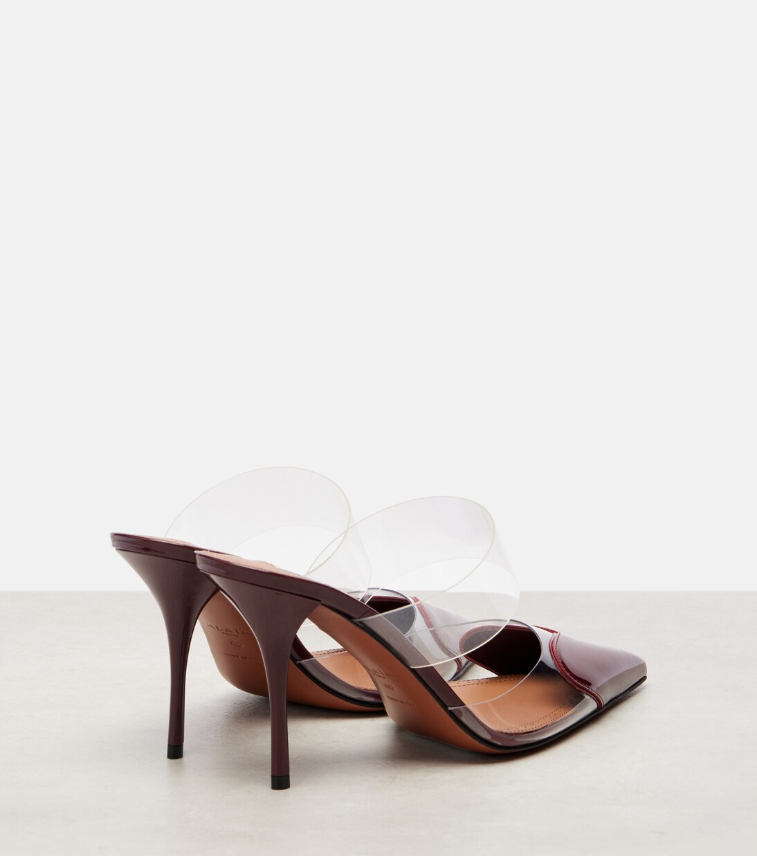 Mules Le Cœur 90 en cuir verni et PU | Alaïa