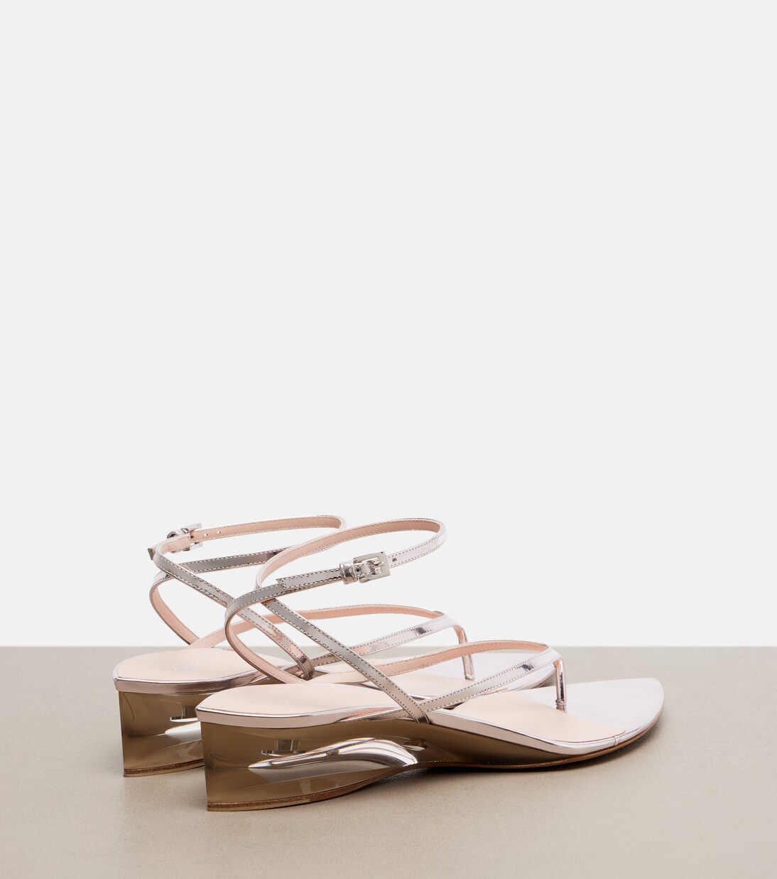 Invisible leather wedge thong sandals | Alaïa