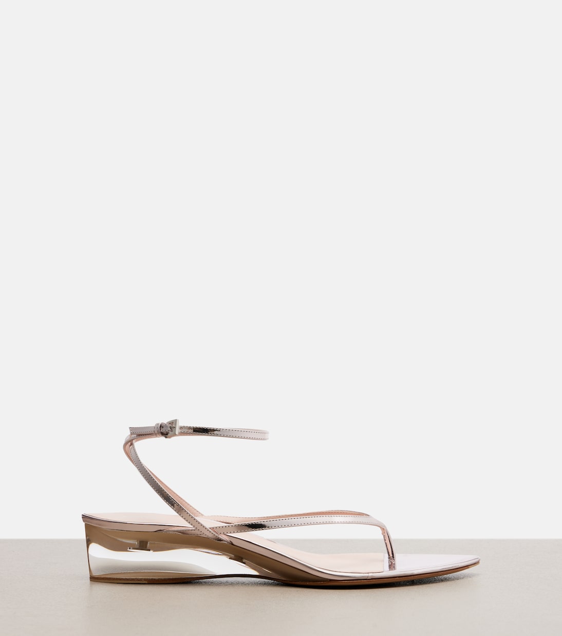 Invisible leather wedge thong sandals | Alaïa