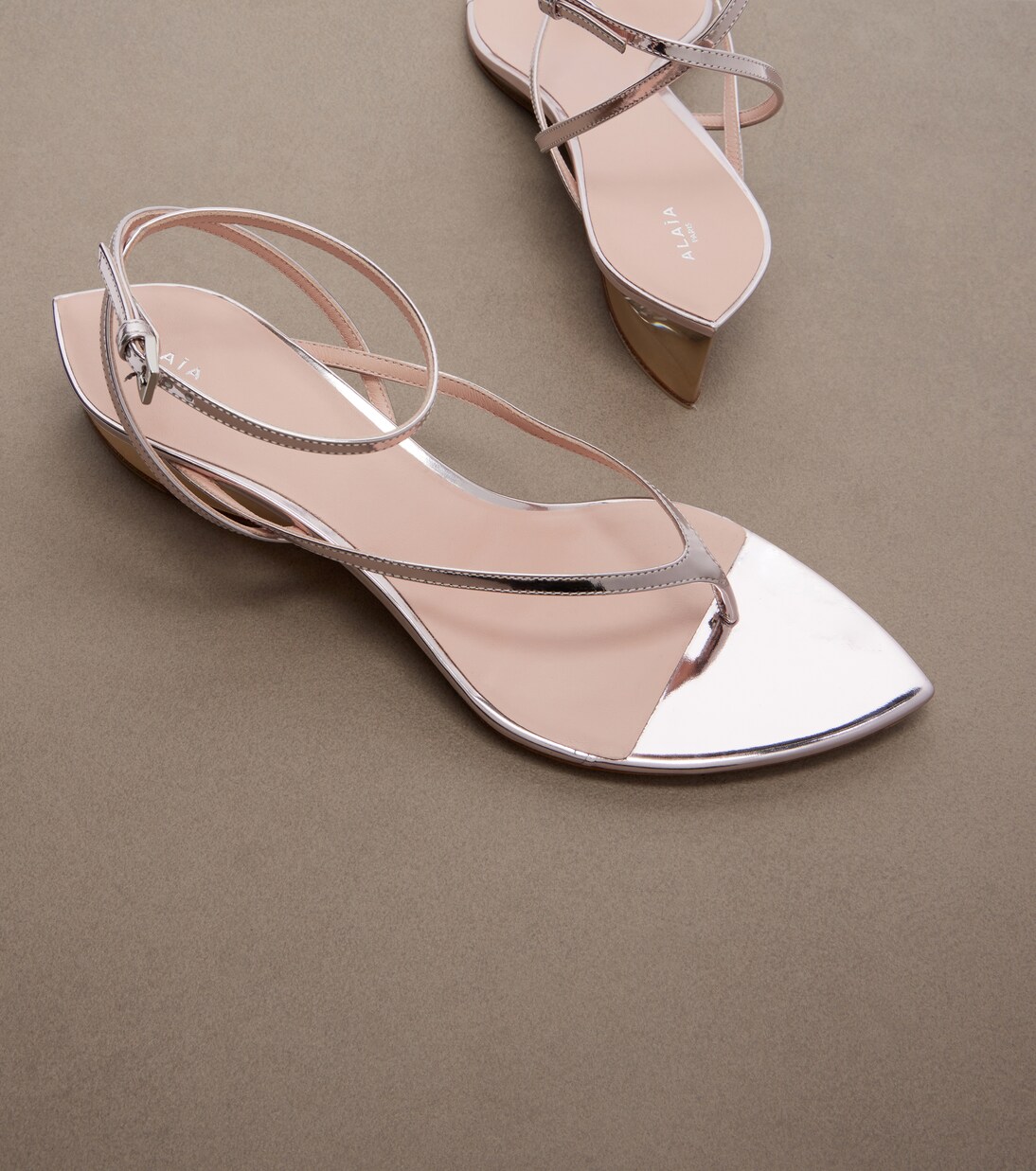 Invisible leather wedge thong sandals | Alaïa