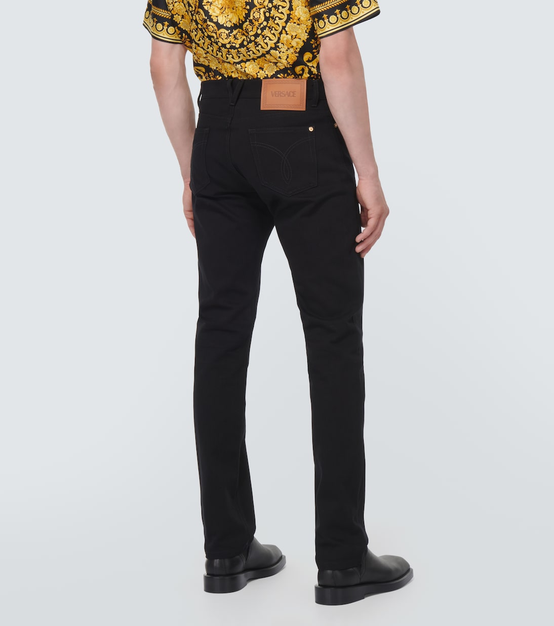 Embellished mid-rise straight jeans | Versace