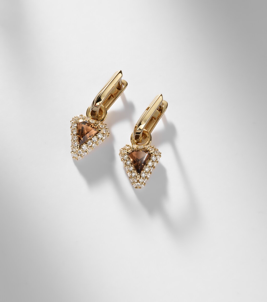 Power 14kt gold huggie earrings with diamonds and garnet | Stone and Strand