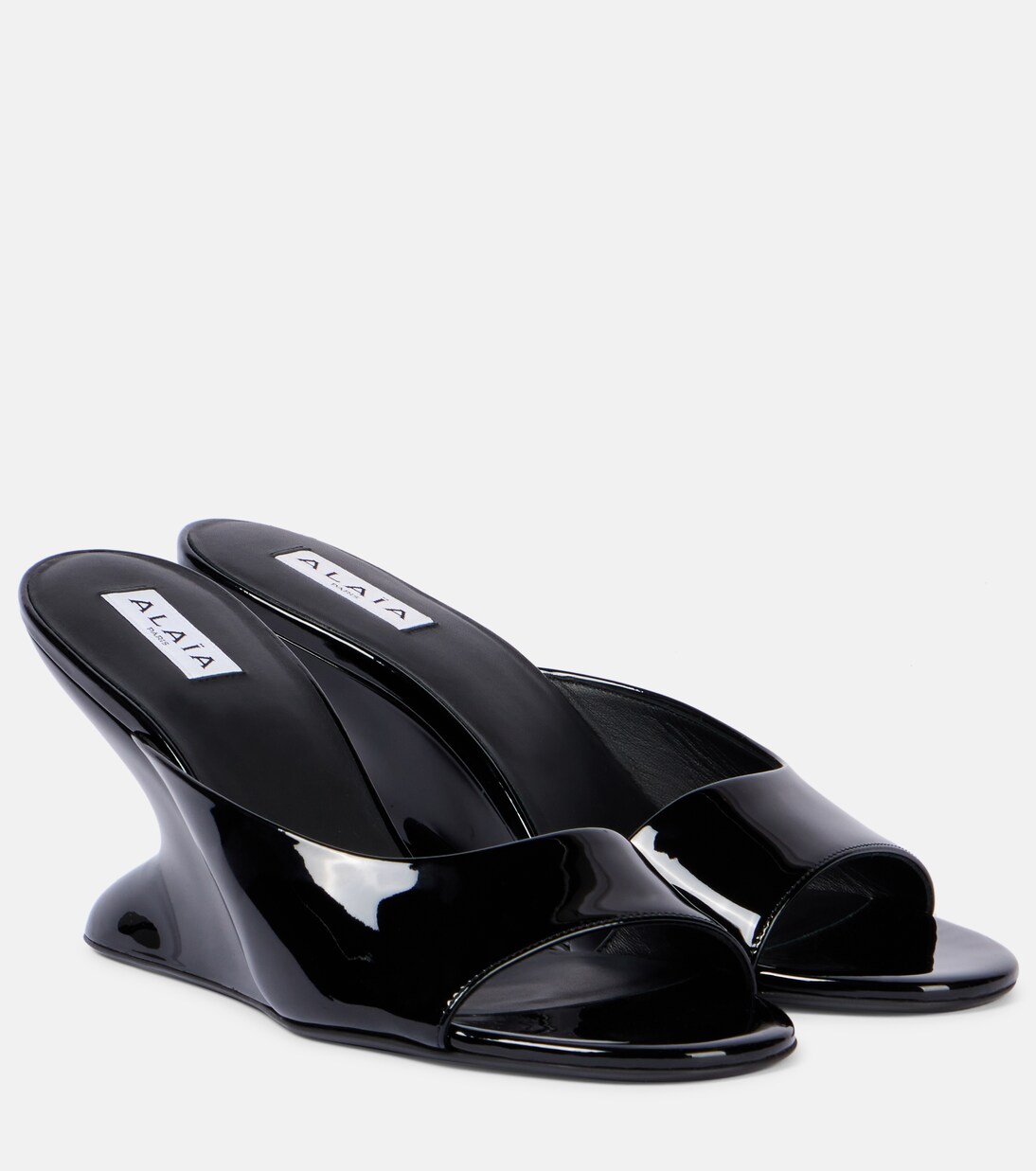 Curve 75 patent leather wedge mules | Alaïa