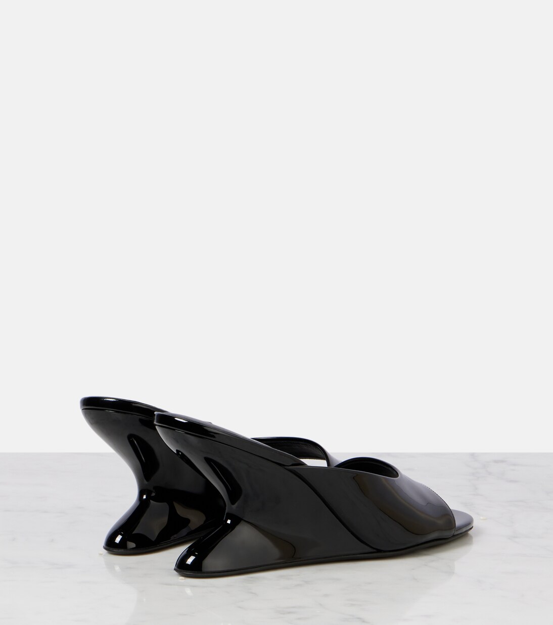 Curve 75 patent leather wedge mules | Alaïa