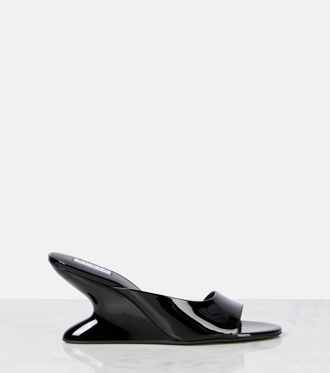Curve 75 patent leather wedge mules | Alaïa