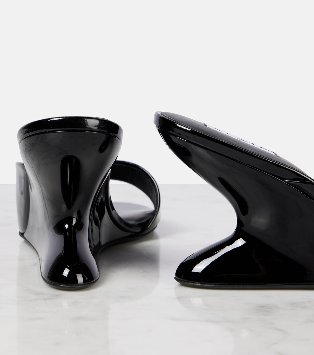 Curve 75 patent leather wedge mules | Alaïa