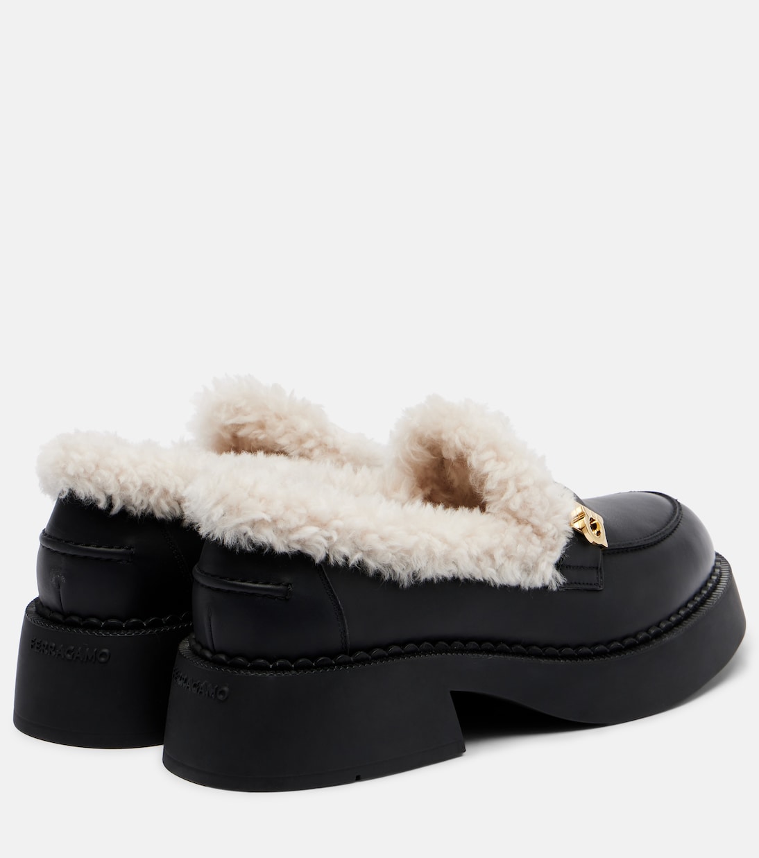 Caminia shearling-trimmed leather loafers | Ferragamo