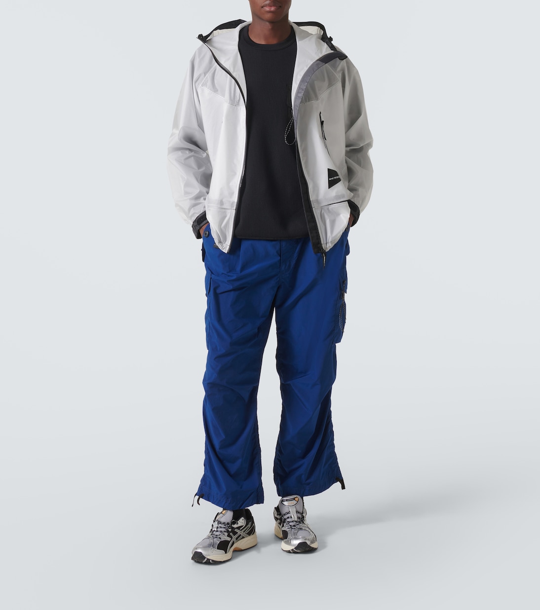 Paneled PU raincoat | And Wander