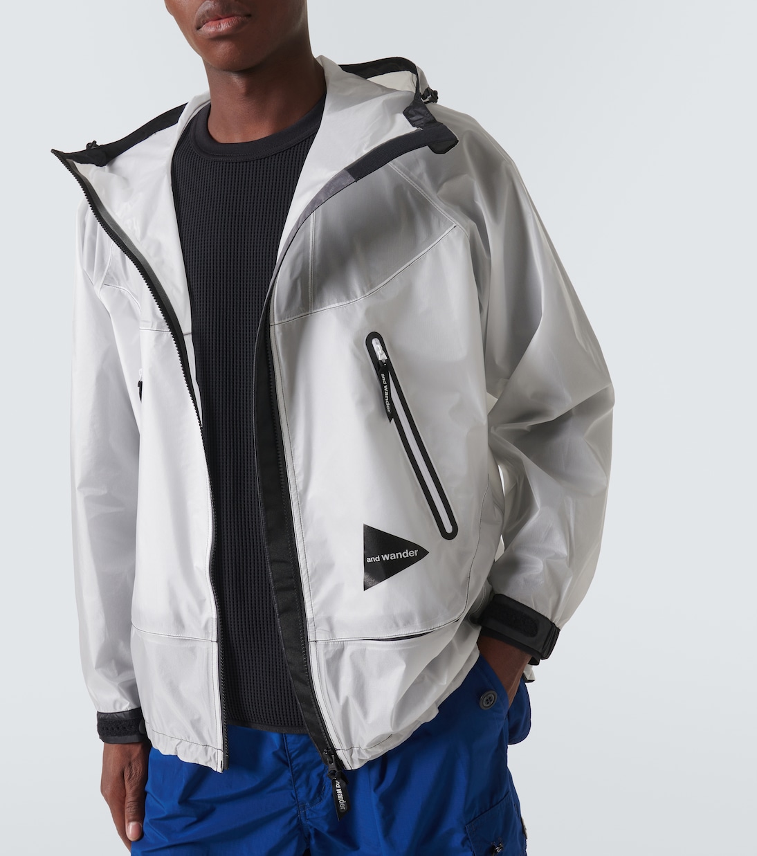 Paneled PU raincoat | And Wander