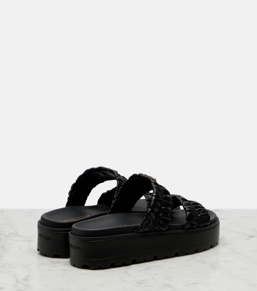 Matelassé leather platform sandals | Prada