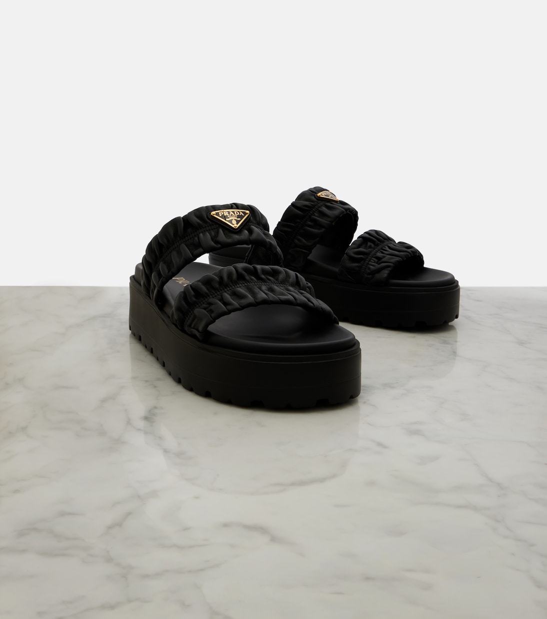 Matelassé leather platform sandals | Prada