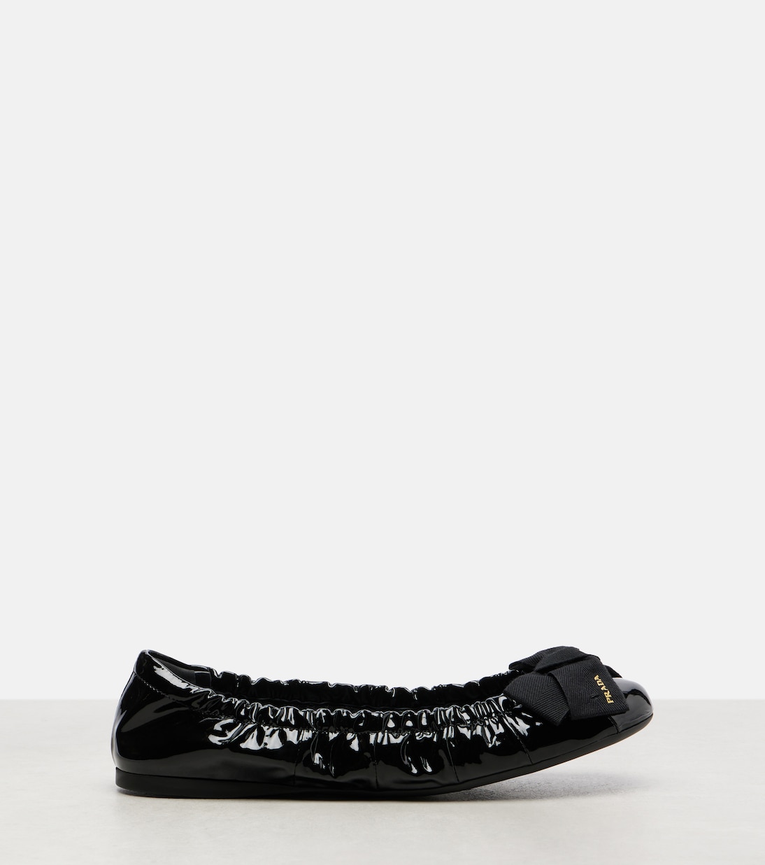 Bow-detail patent leather ballet flats | Prada