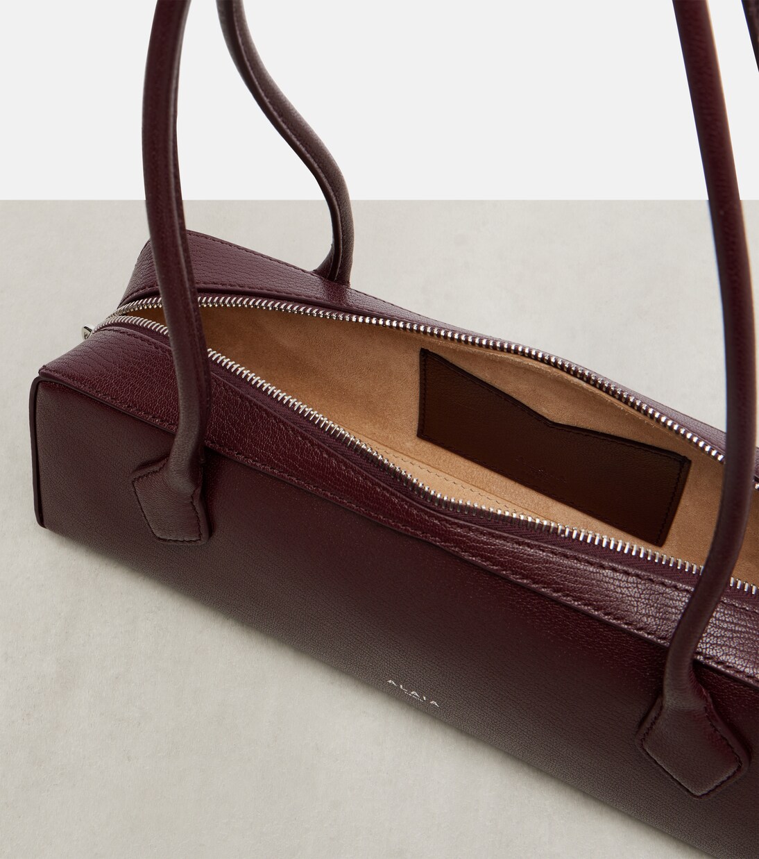 Le Teckel Medium leather shoulder bag | Alaïa