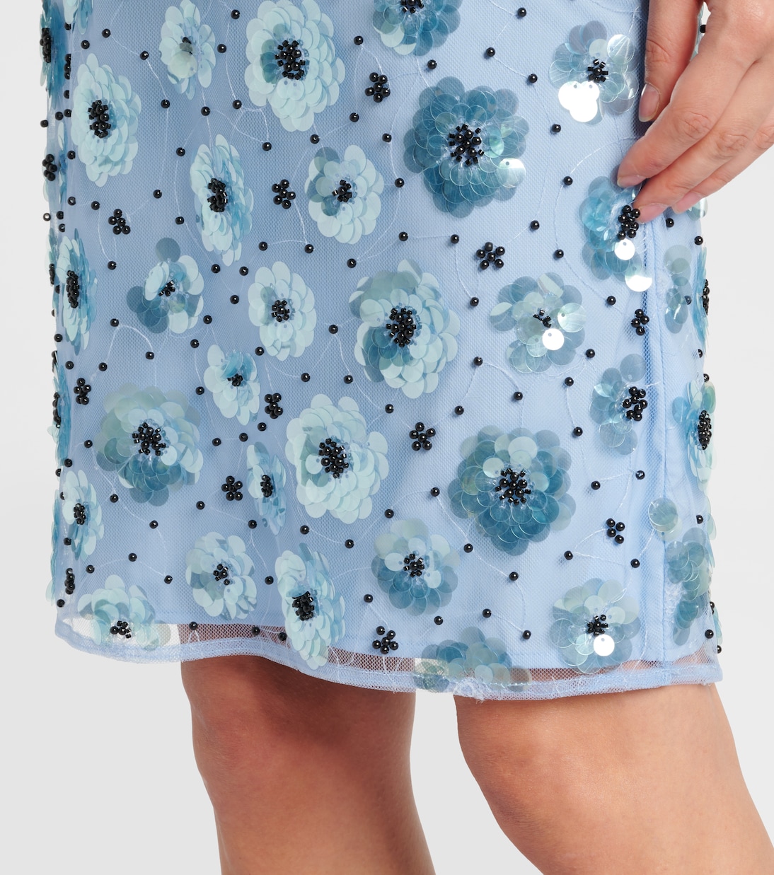 Mini-jupe à taille haute et à fleurs  | Rotate