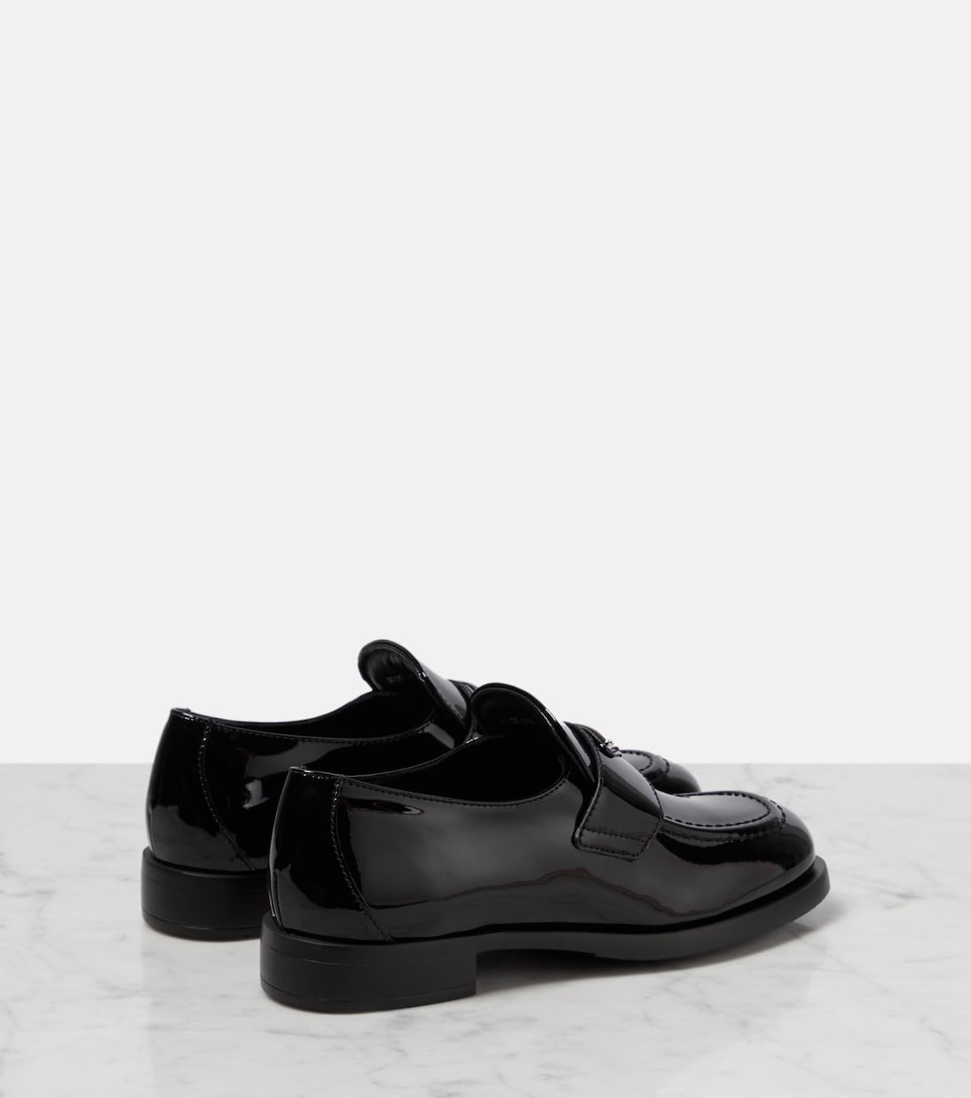 Mocassins en cuir verni à logo | Prada