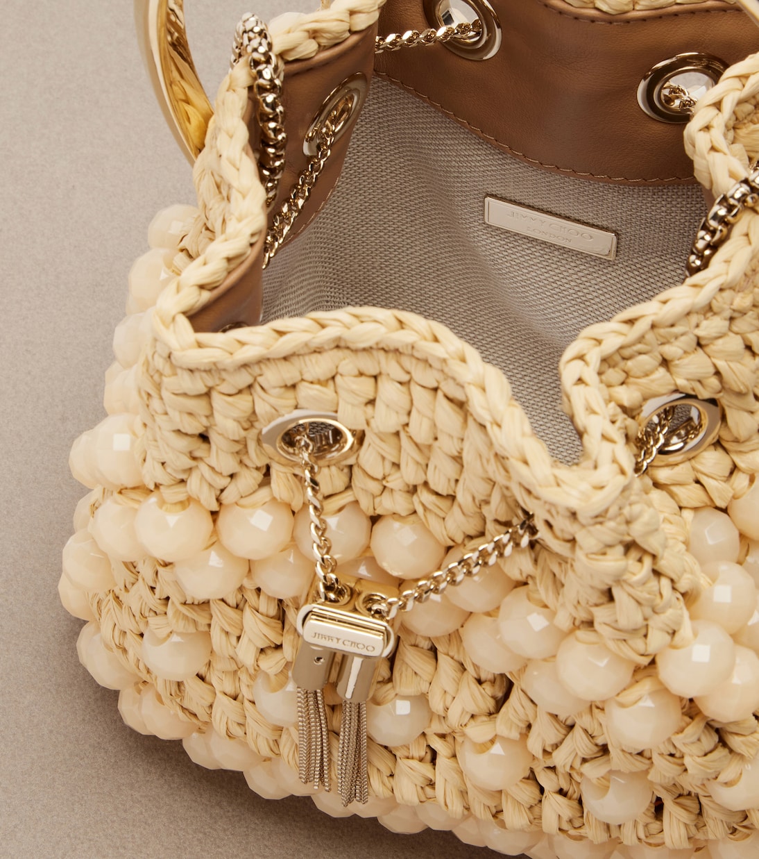 Sac seau Bon Bon Small en raphia | Jimmy Choo