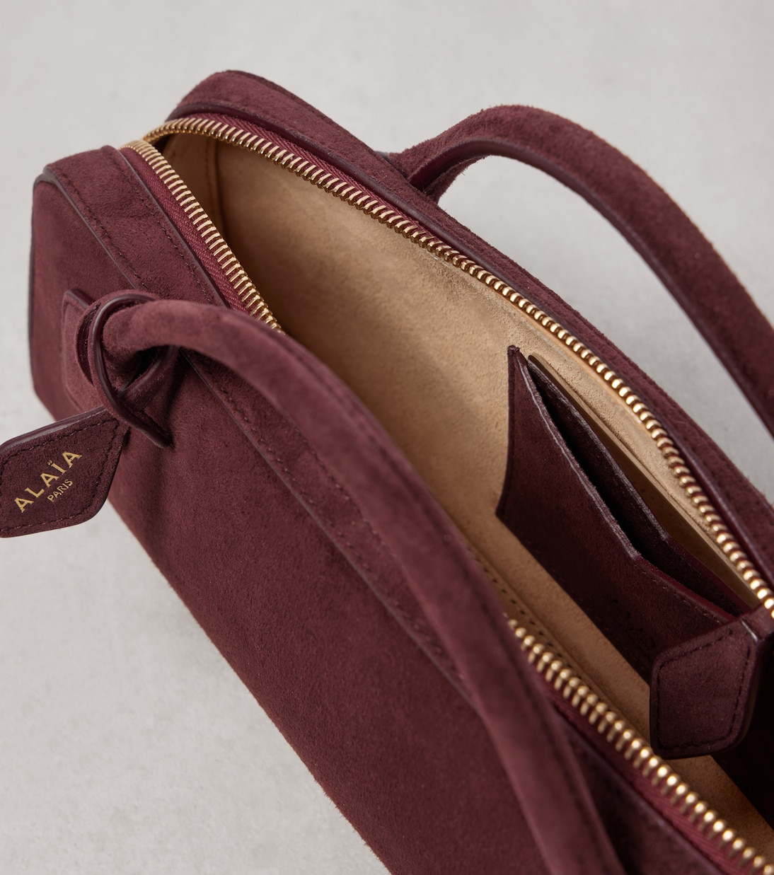 Le Teckel suede clutch  | Alaïa