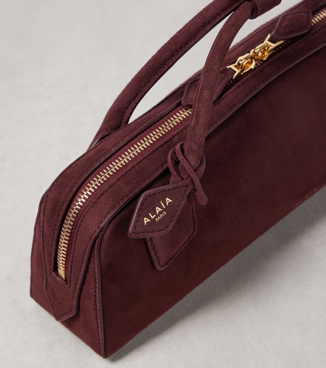 Le Teckel suede clutch  | Alaïa