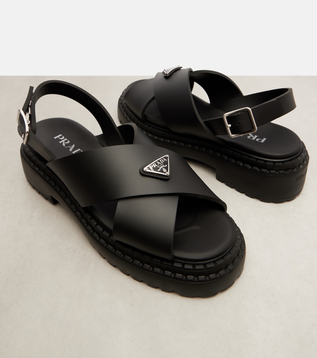 Logo rubber platform sandals | Prada