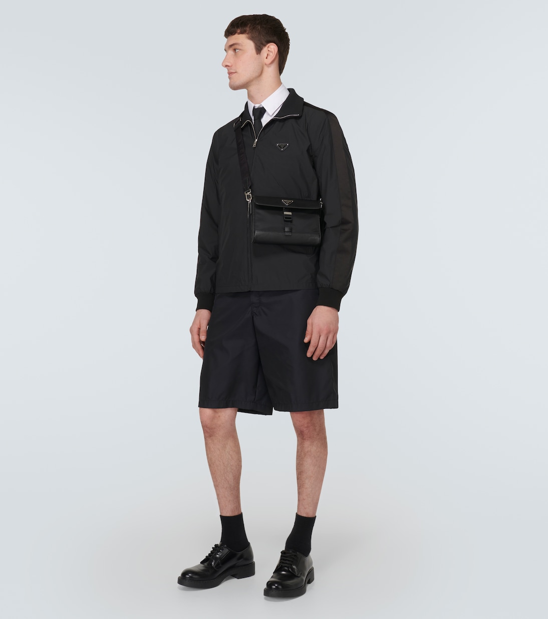 Re-Nylon leather-trimmed crossbody bag | Prada