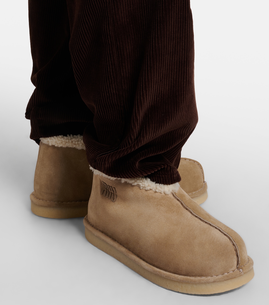 Shearling-lined suede ankle boots | Miu Miu