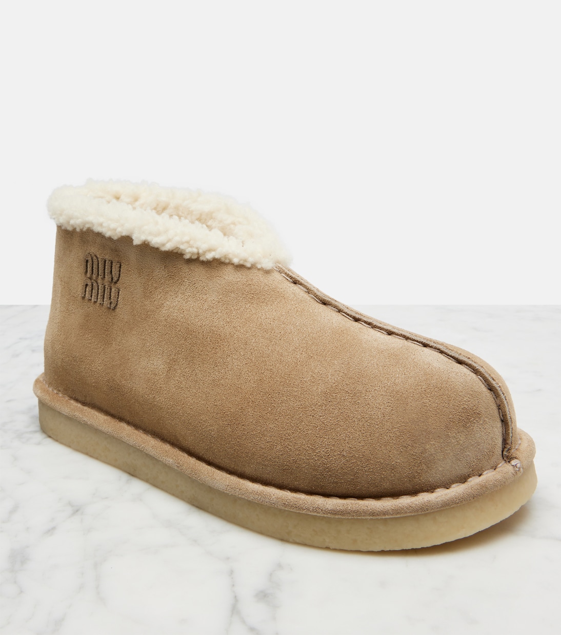 Shearling-lined suede ankle boots | Miu Miu