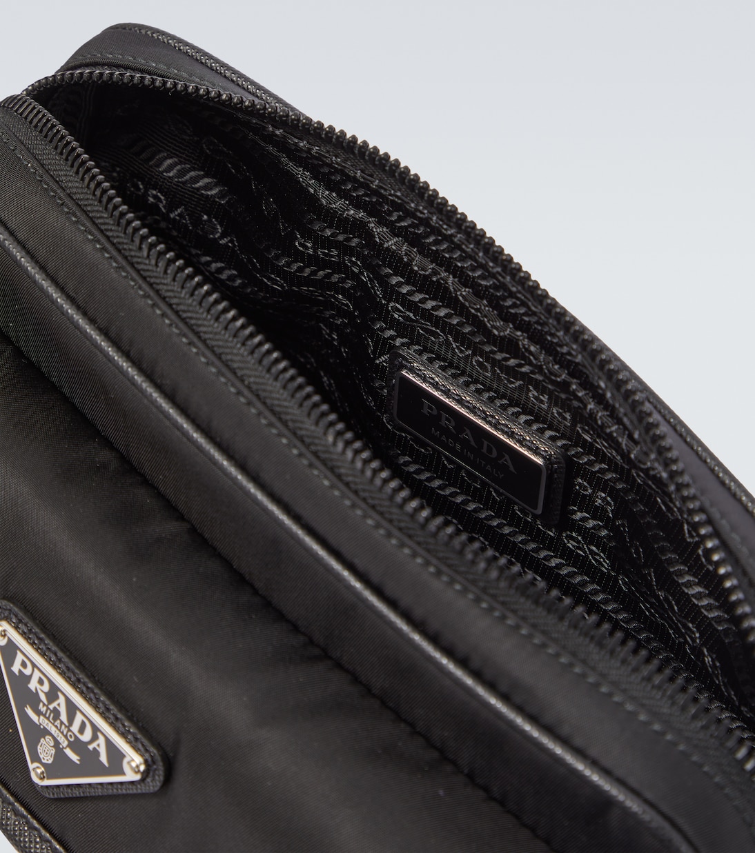 Re-Nylon leather-trimmed shoulder bag | Prada