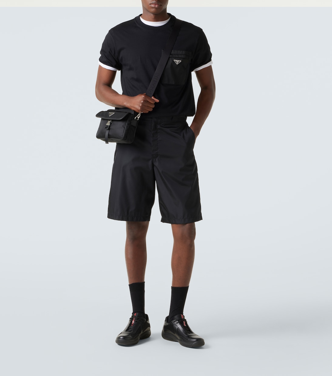 Re-Nylon leather-trimmed shoulder bag | Prada