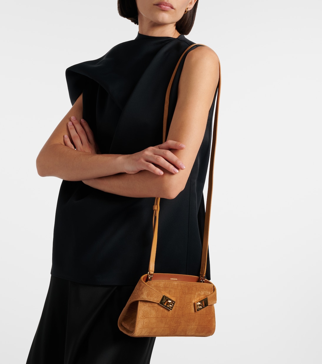 Hug Mini croc-effect suede clutch | Ferragamo