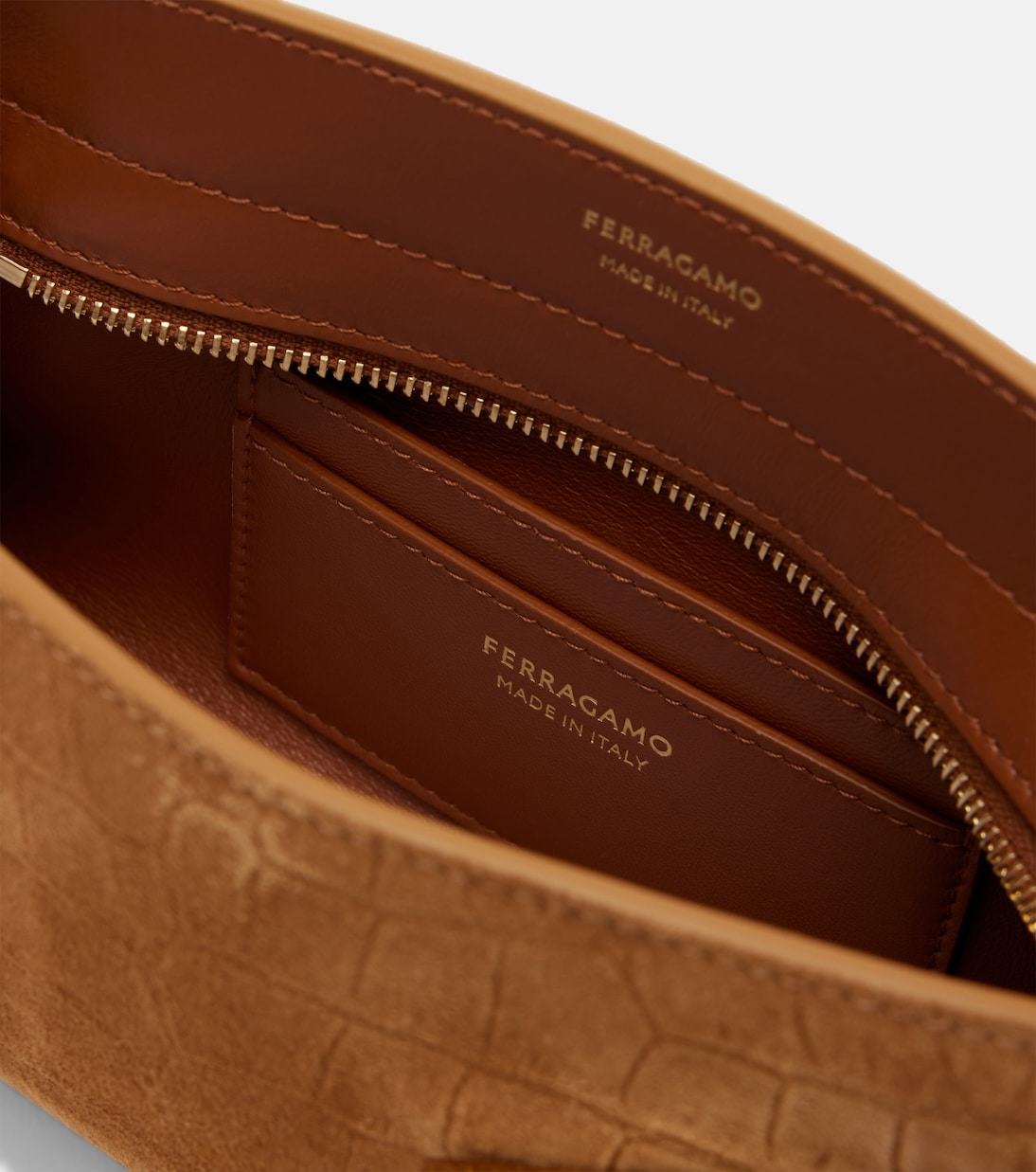 Hug Mini croc-effect suede clutch | Ferragamo