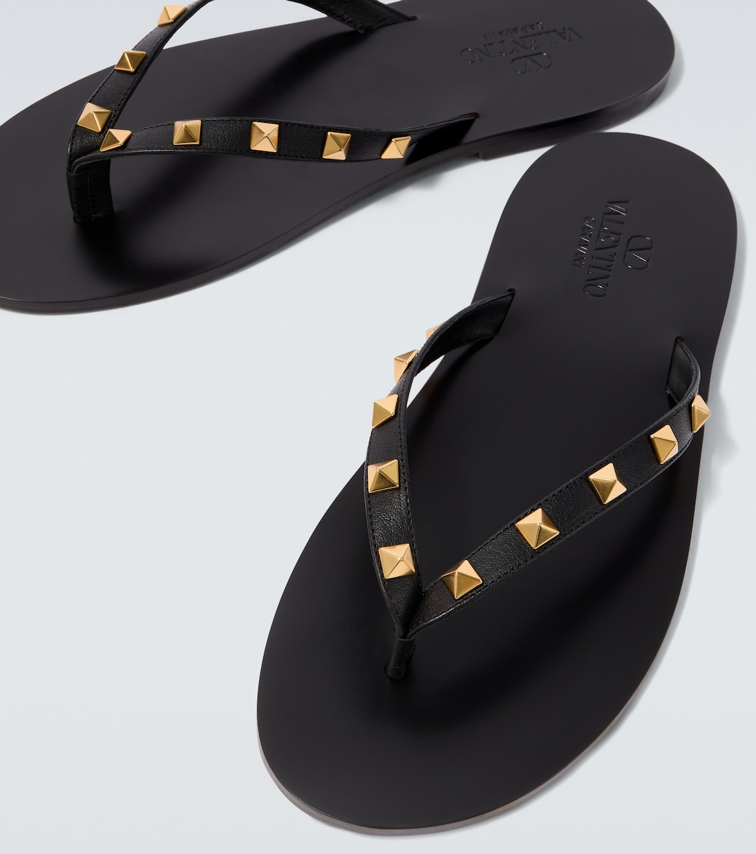 Rockstud leather thong sandals | Valentino Garavani