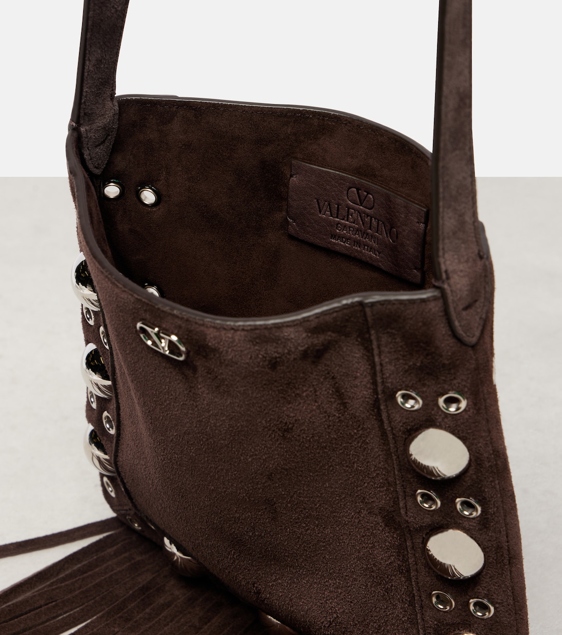 Nellcôte Small fringed suede shoulder bag | Valentino Garavani