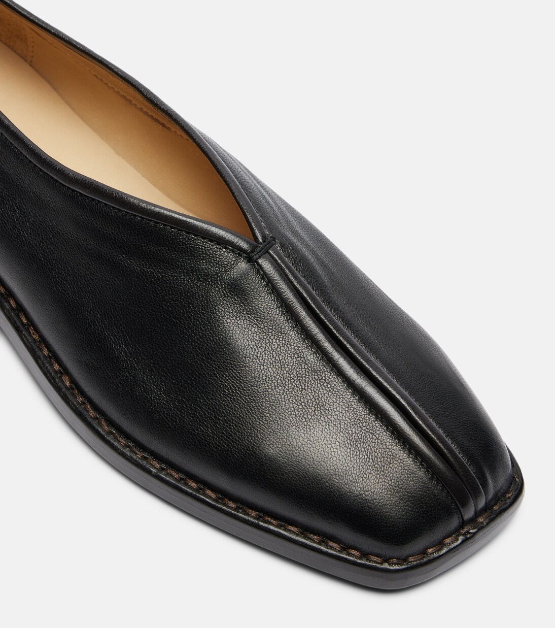 Piped leather slip-on shoes | Lemaire