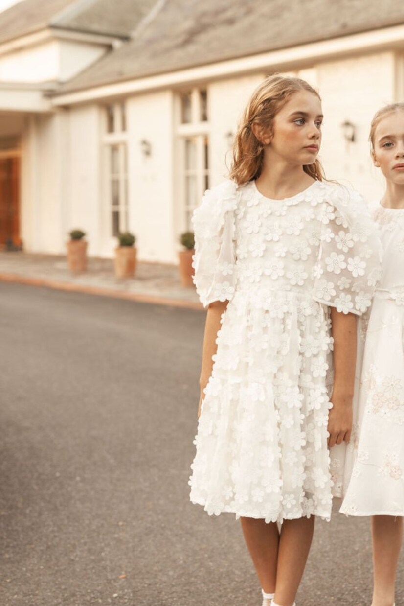 Robe à fleurs et manches bouffantes | Petite Amalie  