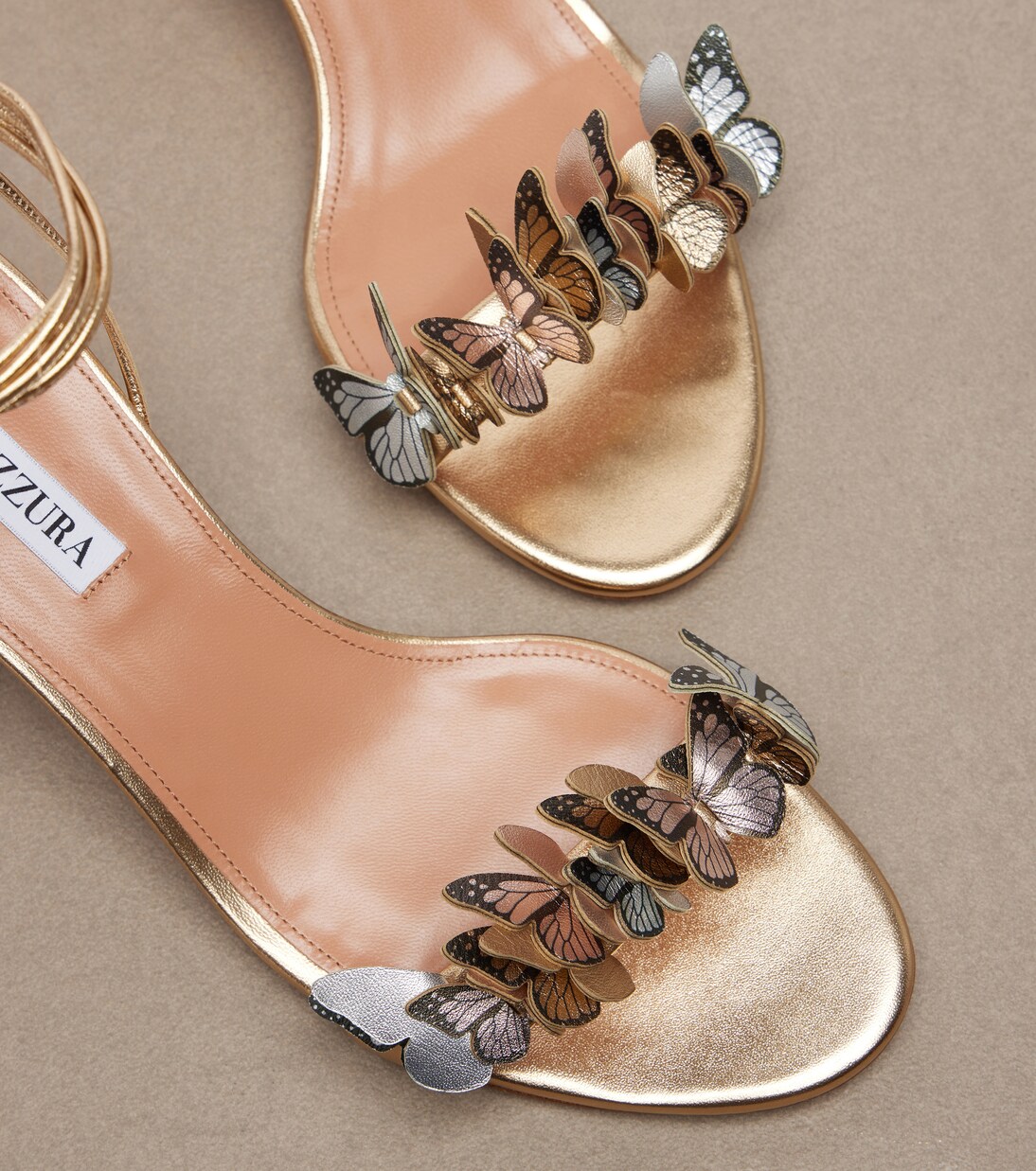 Papillon appliqué metallic leather sandals | Aquazzura