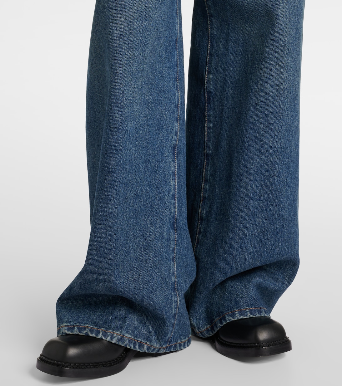 Belted denim jumpsuit | Prada