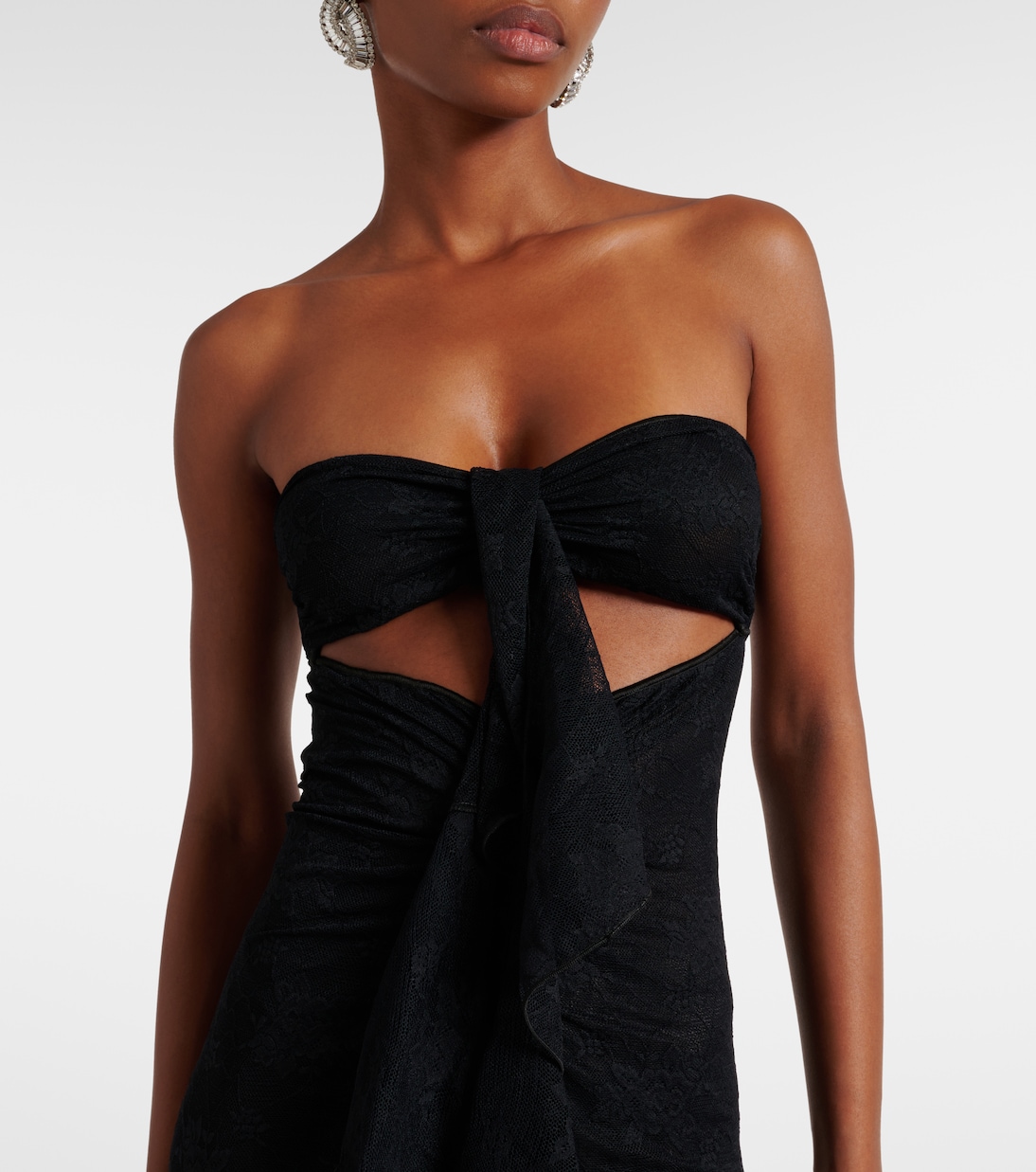 Ruffled cutout lace catsuit | Oséree