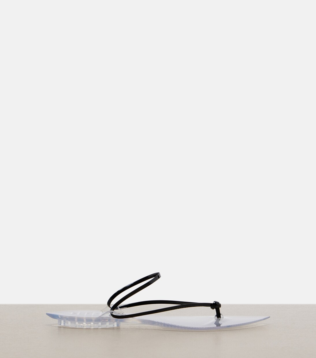 Invisible leather thong sandals | Alaïa