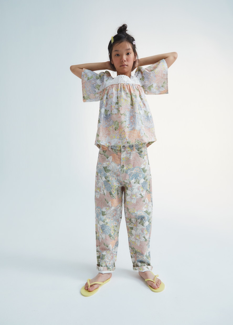 Jeans Irvine | The New Society