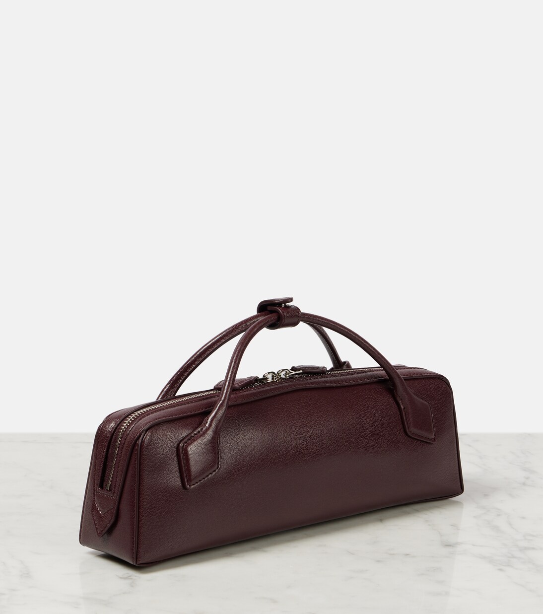 Le Teckel leather clutch | Alaïa